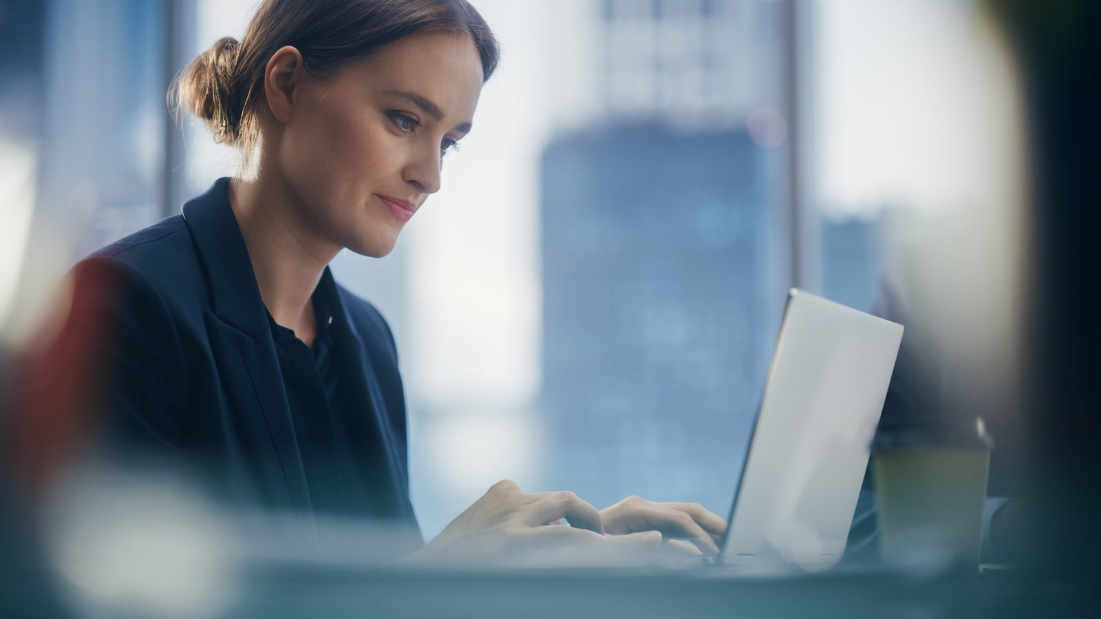 Junior businesswoman working.